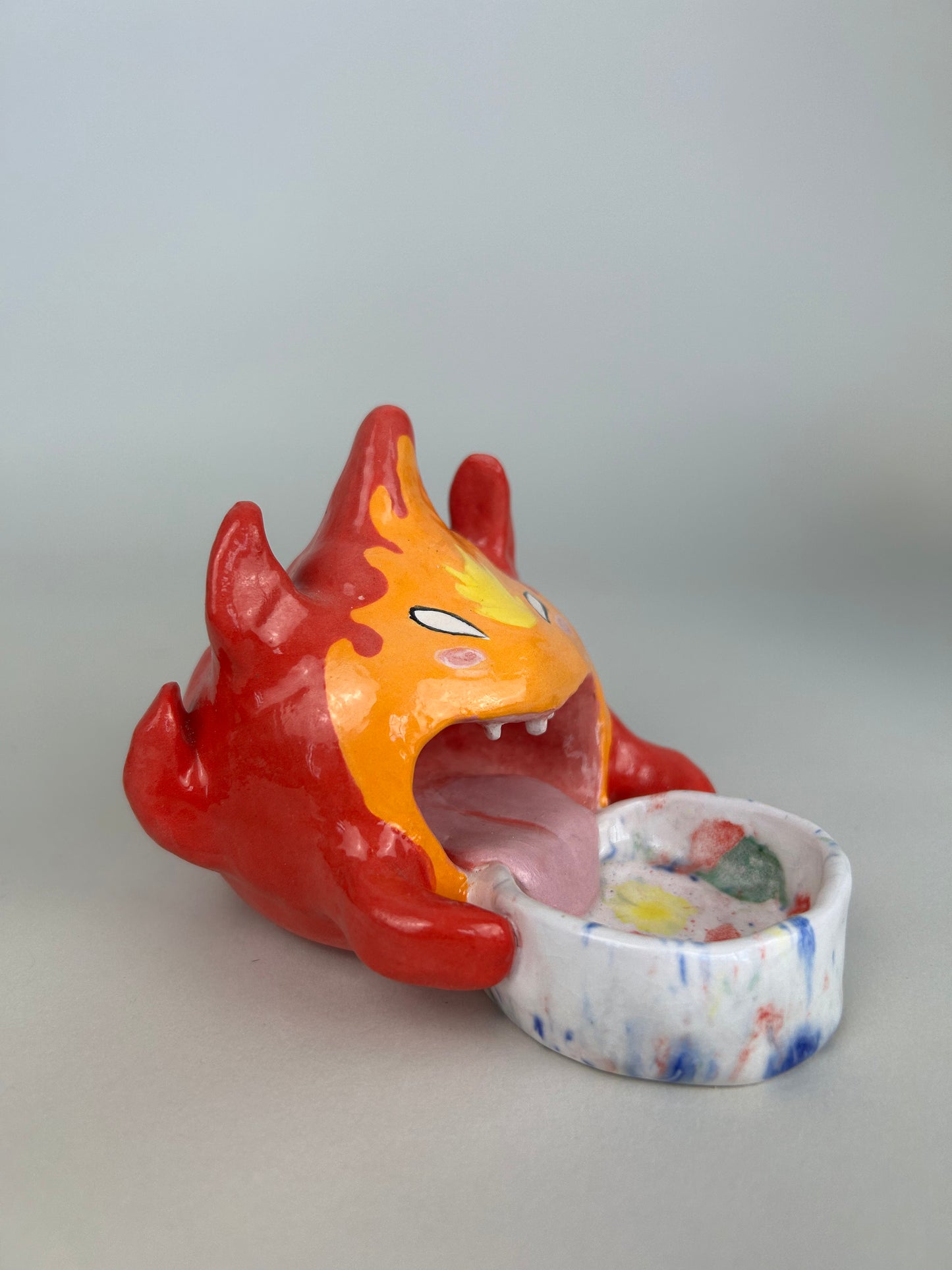 Flame trinket holder